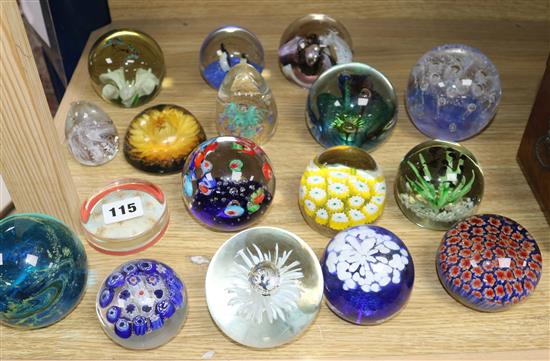 A collection of seventeen paperweights